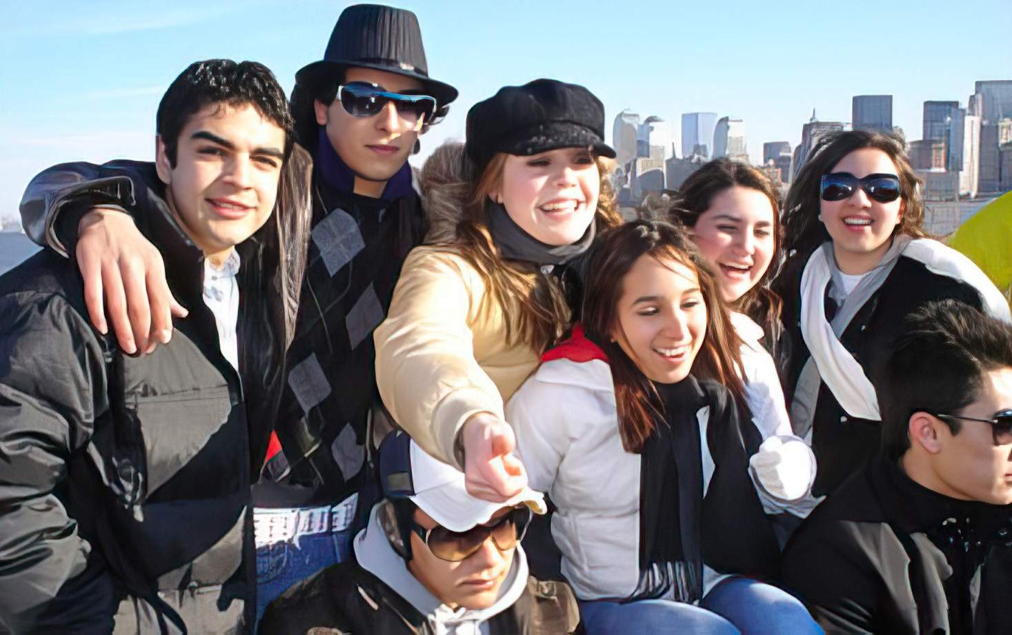 a group of young people posing for a picture